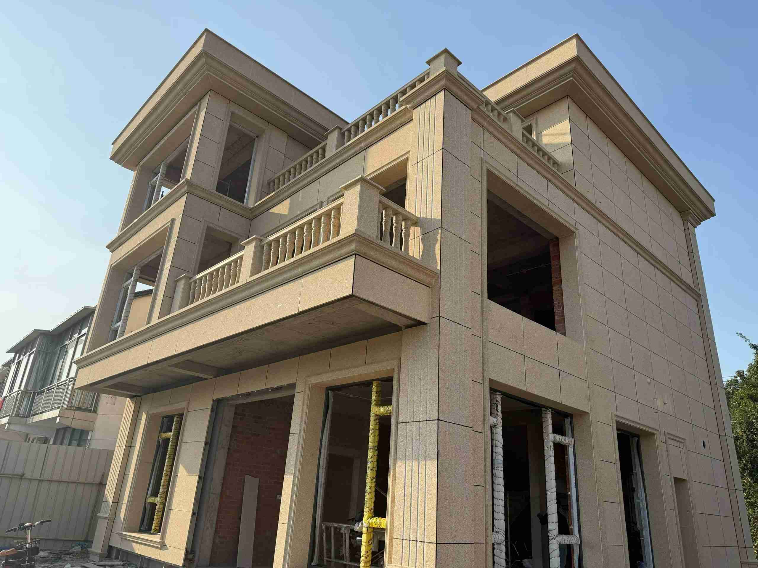 德州 黄金麻花岗岩石材荔枝面外墙干挂效果展示